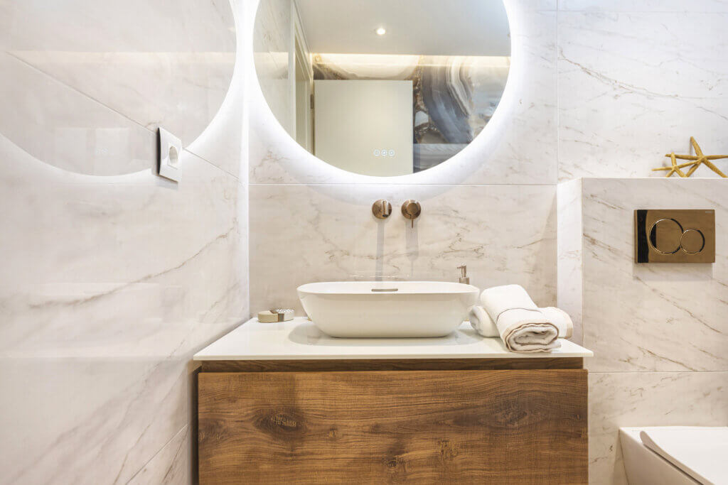 Luxurious ensuite bathroom with marble finish and premium fixtures.